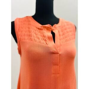 Women’s sleeveless, v-neck top with smocking